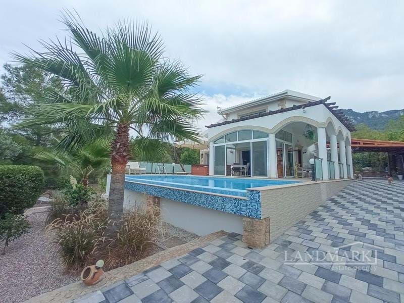 3 bedroom luxury extended villa + 8 m2 x 4 m2 swimming pool + steel framed apartment with outdoor seating area + central heating + air conditioning + generator + car port + CCTV camera system + sea and mountains views